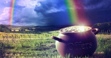 rainbow shining at a pot with gold